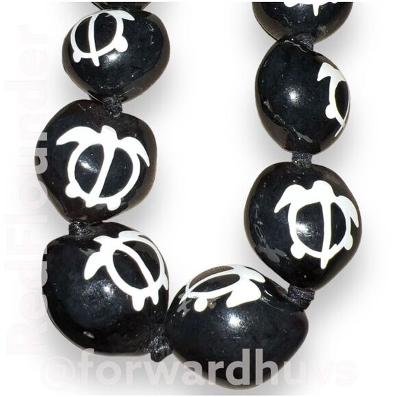 Hand-Painted Black Hawaiian Kukui Nut Necklace with White Turtle Designs - Picture 6 of 7